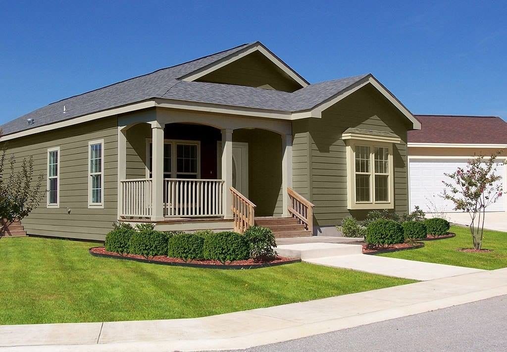 Olive colored house with grey roof