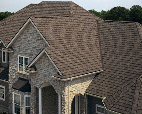 Brown roof on large house