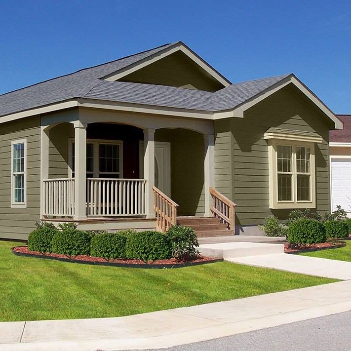 Olive colored house with grey roof