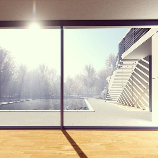 Large window with a pool side view